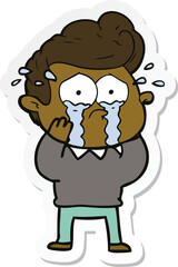sticker of a cartoon crying man