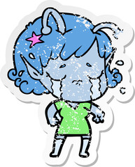 distressed sticker of a cartoon crying alien girl