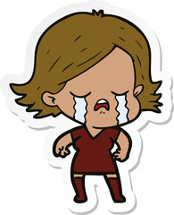 sticker of a cartoon girl crying
