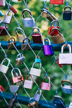 Love locks hanging on fence
