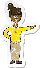 retro distressed sticker of a cartoon woman pointing