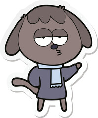 sticker of a cartoon tired dog wearing winter clothes