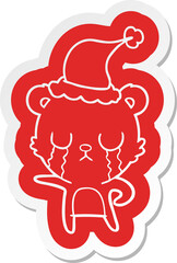 crying cartoon  sticker of a bear wearing santa hat
