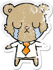 distressed sticker of a crying cartoon bear
