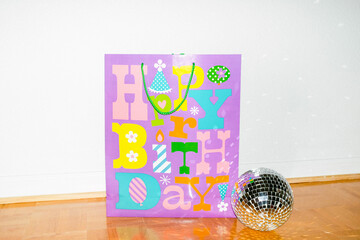 happy birthday bag and disco ball