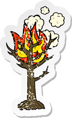 retro distressed sticker of a cartoon burning tree