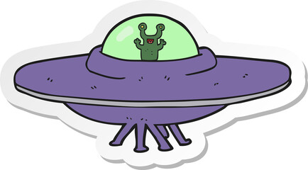 sticker of a cartoon alien spaceship