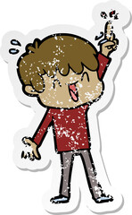 distressed sticker of a cartoon laughing boy