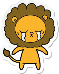 sticker of a crying cartoon lion