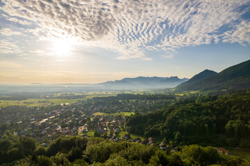 beautiful drone view of Bad Feilnbach in bavaria in the early morning with sunrise