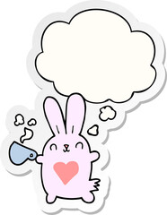 cute cartoon rabbit with love heart and coffee cup and thought bubble as a printed sticker