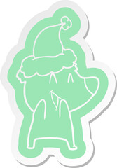 laughing polar bear cartoon  sticker of a wearing santa hat