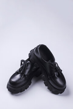 Classic black leather mens shoes with laces isolated on white background