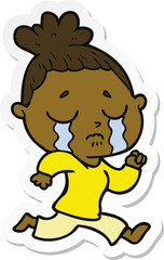 sticker of a cartoon crying woman