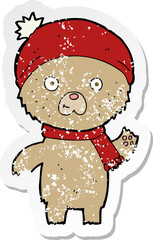 retro distressed sticker of a cartoon waving teddy bear