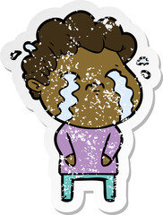 distressed sticker of a cartoon man crying