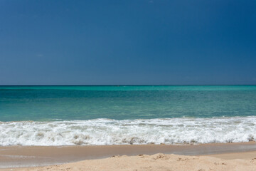Fototapeta na wymiar Sea view from the shore. blue sea. tropical sea. Beach. Walk along the shore of the beach.