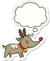 cartoon christmas reindeer and thought bubble as a printed sticker