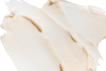 Swatch of beige cream texture, cosmetics for face and body on a isolated white background. Drop smear. Real photo