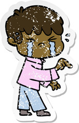distressed sticker of a crying boy cartoon