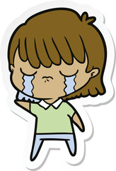 sticker of a cartoon woman crying