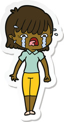 sticker of a cartoon girl crying