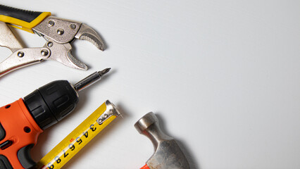 Tools on a white background with space for text. Top view.