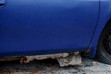 Car with Rust and Corrosion.