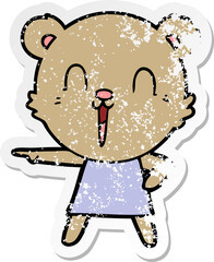 distressed sticker of a happy cartoon bear pointing