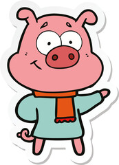 sticker of a happy cartoon pig wearing warm clothes