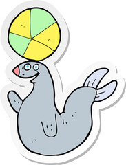 sticker of a cartoon seal balancing ball