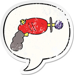 cartoon ray gun and speech bubble distressed sticker