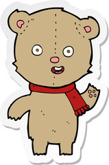 sticker of a cartoon waving teddy bear with scarf