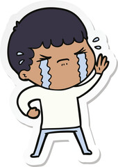 sticker of a cartoon man crying