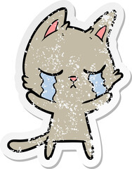 distressed sticker of a crying cartoon cat