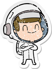 distressed sticker of a happy cartoon astronaut
