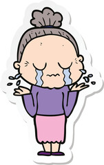 Obraz premium sticker of a cartoon crying old lady