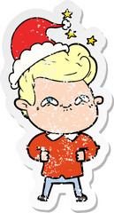 distressed sticker cartoon of a excited man wearing santa hat