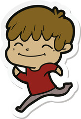 sticker of a cartoon happy boy