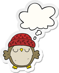 cute cartoon owl in hat and thought bubble as a printed sticker