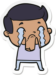sticker of a cartoon man crying