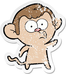 distressed sticker of a cartoon hooting monkey