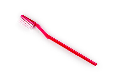 A simple toothbrush on a white background.