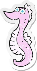 retro distressed sticker of a cartoon seahorse