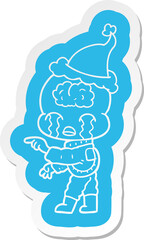 cartoon  sticker of a big brain alien crying and pointing wearing santa hat