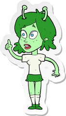 sticker of a cartoon space alien