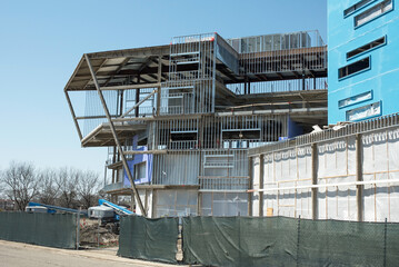 Skeletal Overhang of New Building Construction