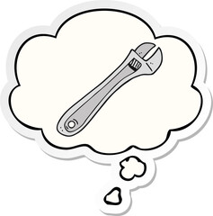 cartoon spanner and thought bubble as a printed sticker
