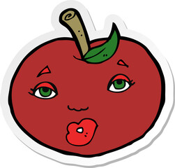 sticker of a cartoon apple with face