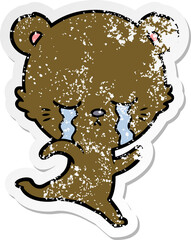 distressed sticker of a crying cartoon bear